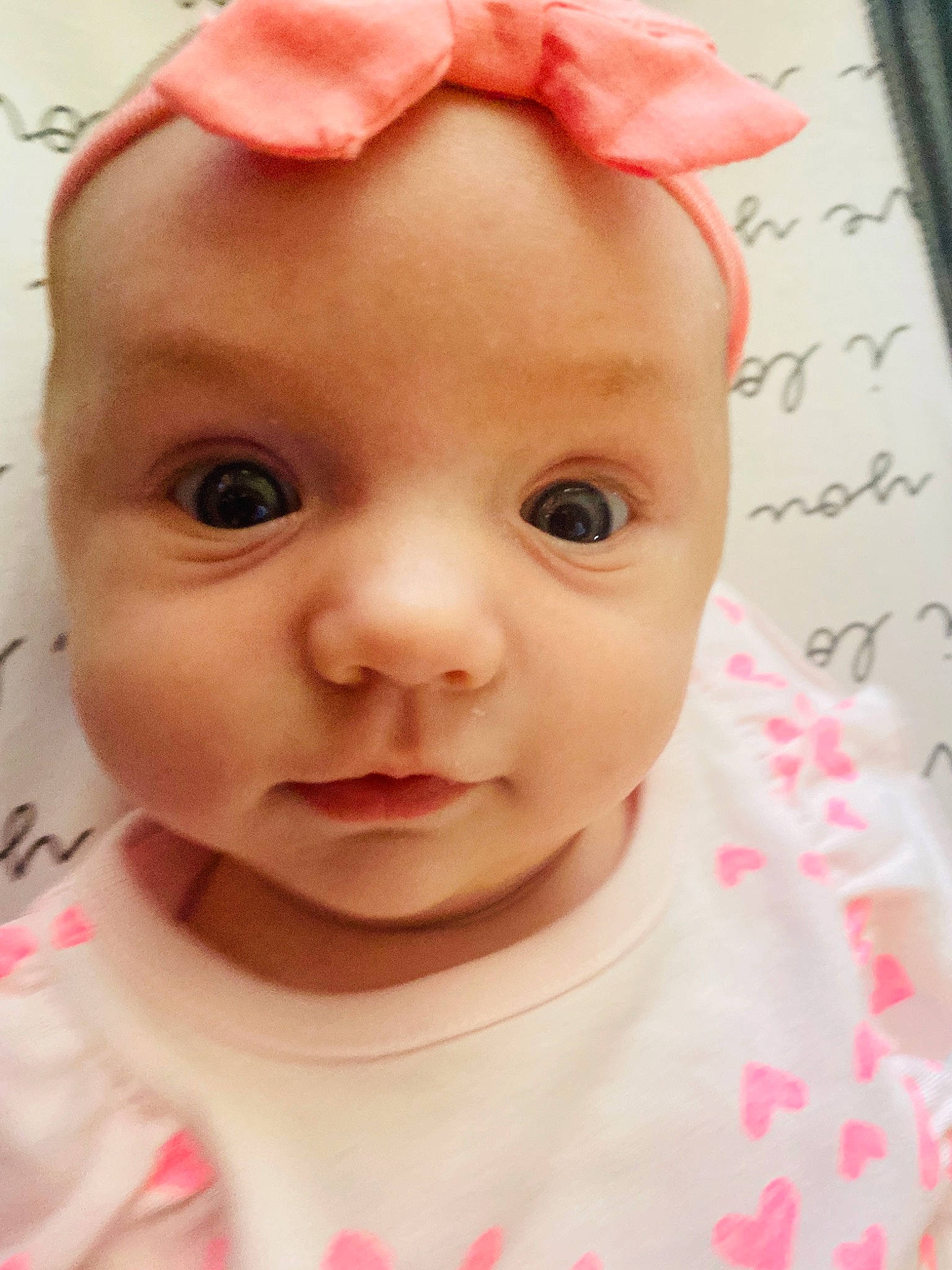 Paisley is registered to the contest to win money with this photo: baby, baby_toddler_clothing, cheek, chin, ear, eye, eyebrow, eyelash, face, forehead, happy, lip, mouth, neck, nose, person, pink, skin, sleeve, textile