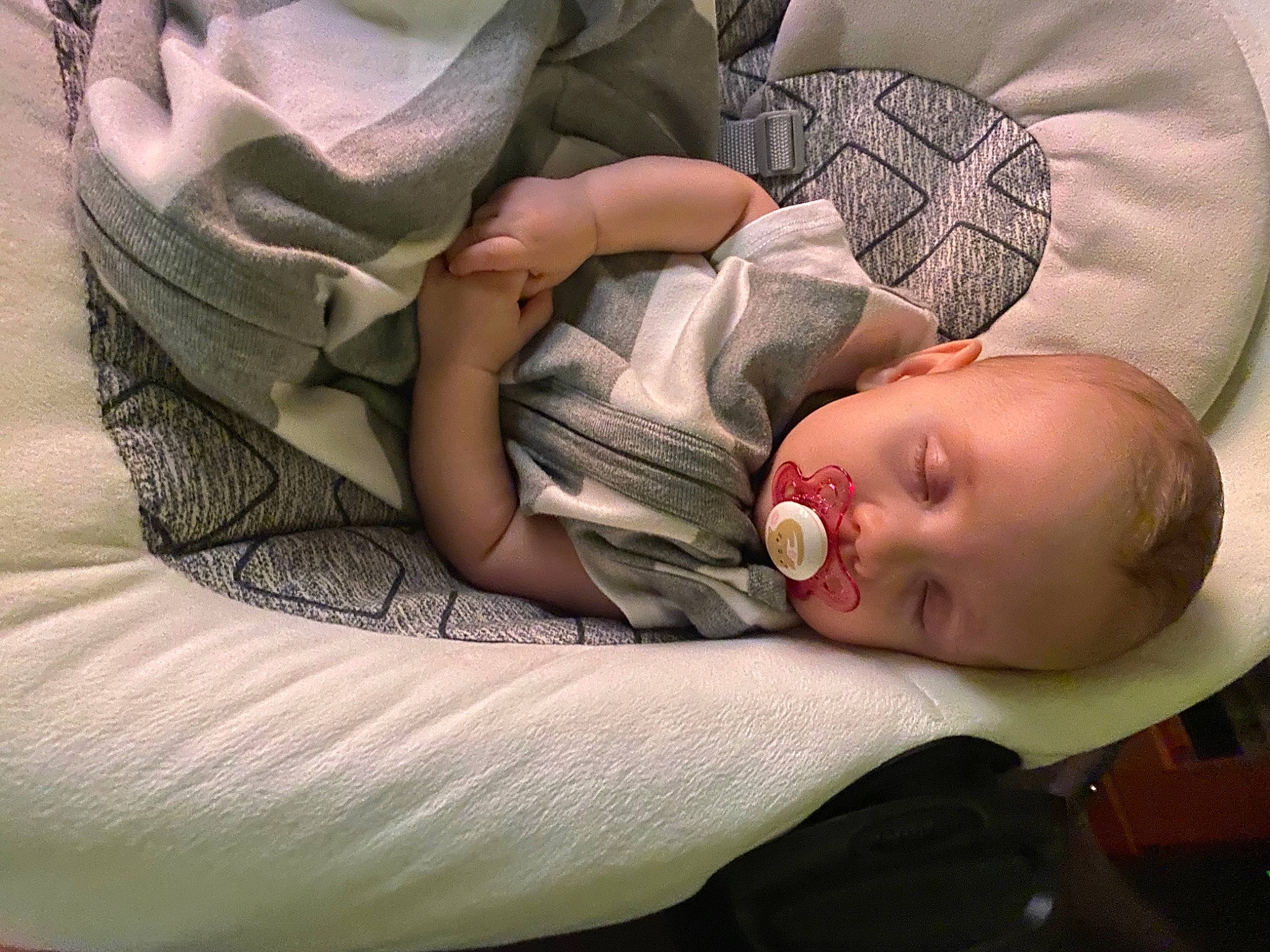 Paisley joined the competition — help win amazing prizes! arm, baby, baby_products, baby_toddler_clothing, cheek, child, comfort, eye, facial_expression, finger, grass, hand, human_body, linens, mouth, person, sitting, skin, sleeve, toddler