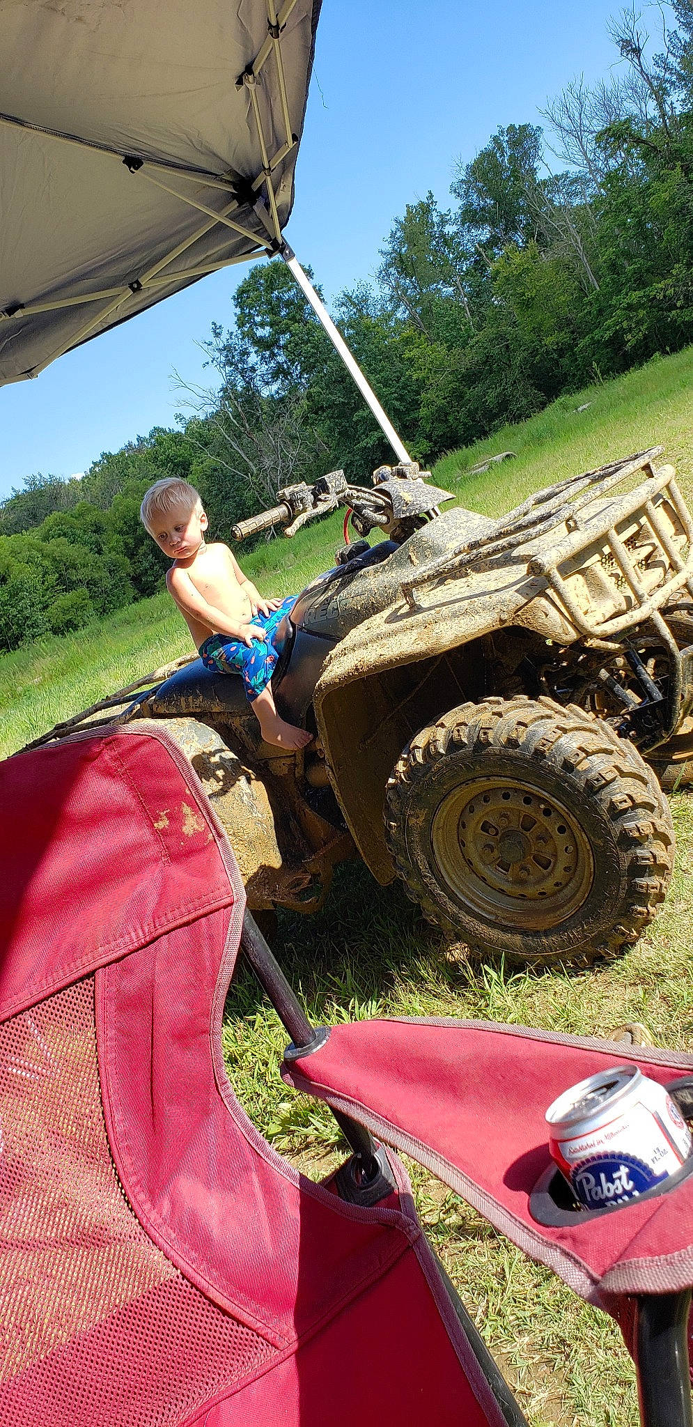 Nikolas is registered to the contest to win money with this photo: automotive_tire, automotive_wheel_system, car, mud, off_road_vehicle, off_roading, person, soil, tire, tree, vehicle