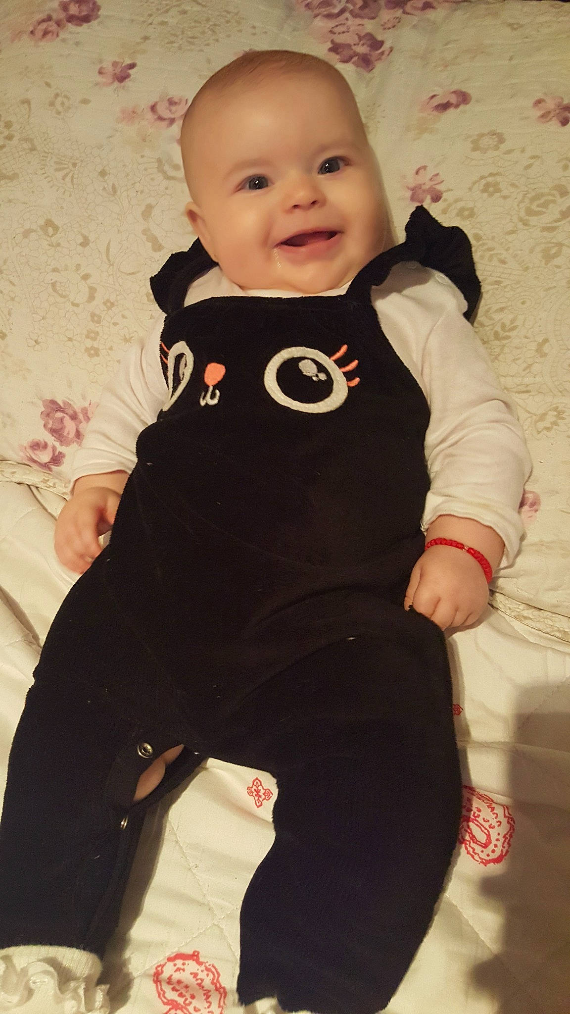 Daria is registered to the contest to win money with this photo: baby_products, black, boy, child, girl, infant, outerwear, person, product, skin, sleeve, smile, standing, t_shirt, textile, toddler