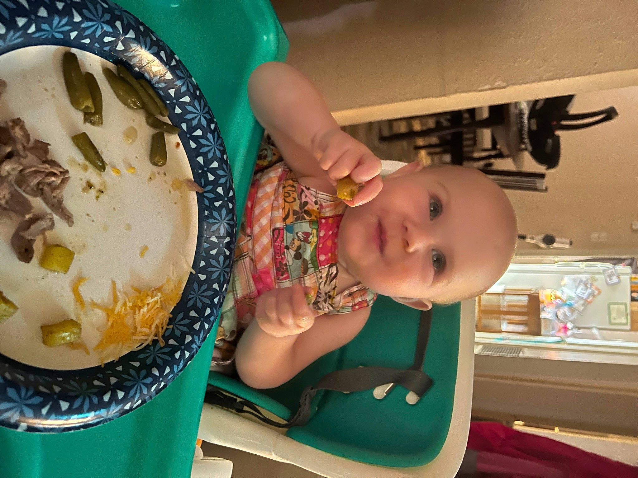 Allie is registered to the contest to win money with this photo: baby, baby_products, baby_safety, baby_toddler_clothing, bowl, chair, child, cooking, dishware, food, fun, hairstyle, hand, person, porcelain, recipe, serveware, shelf, smile, tableware