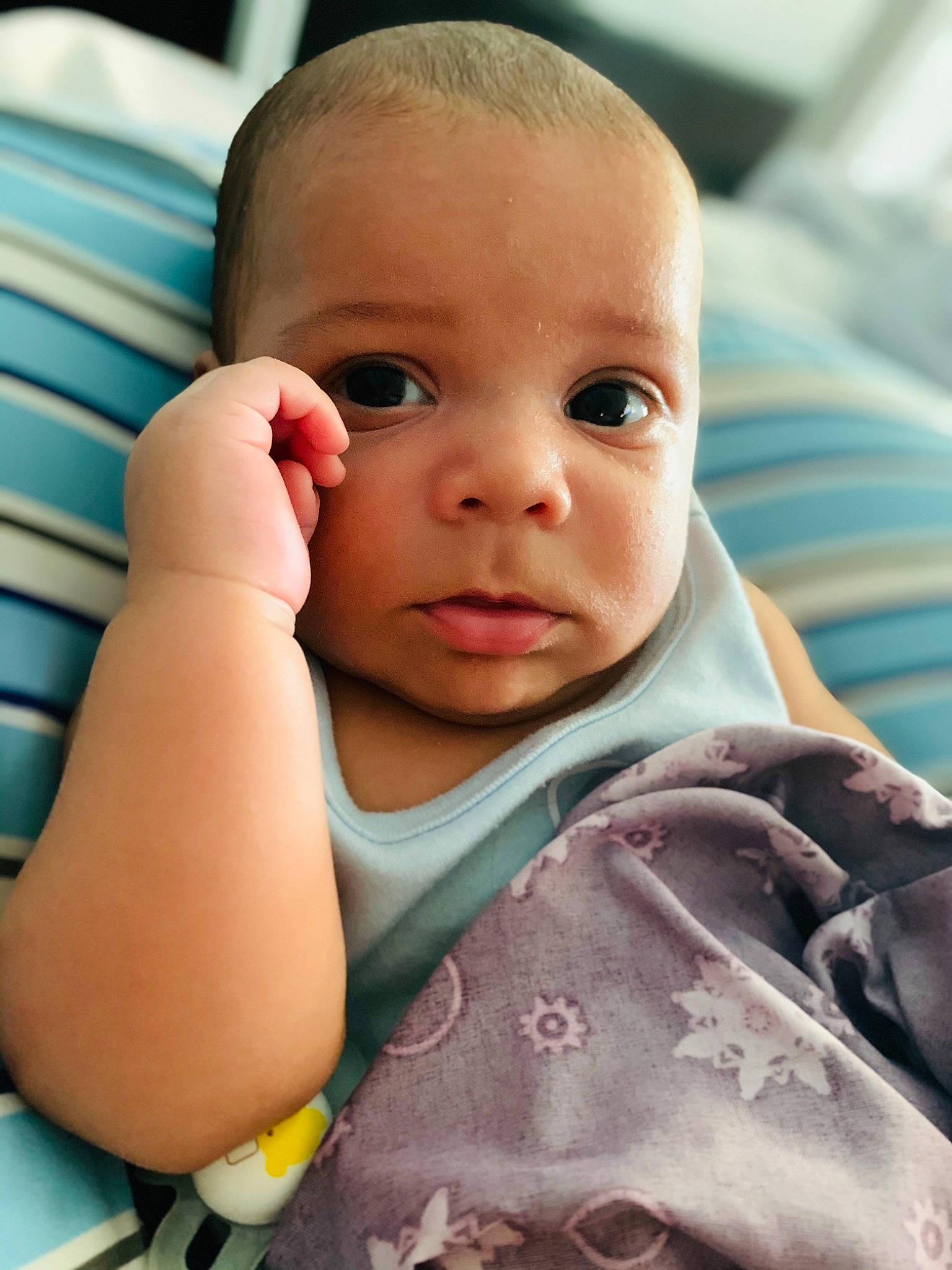 Enzo is registered to the contest to win money with this photo: azure, baby, baby_toddler_clothing, blue, cheek, chin, comfort, eyebrow, eyelash, finger, gesture, human, iris, lip, mammal, mouth, neck, nose, person, skin