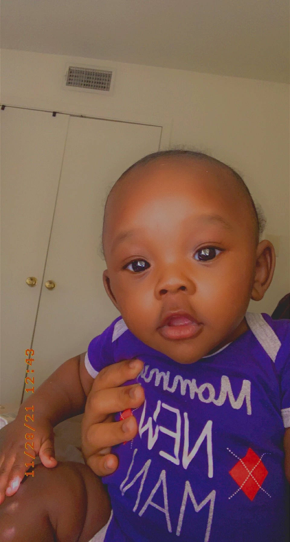Dakari joined the competition — help win amazing prizes! arm, baby_toddler_clothing, cheek, chin, ear, eyebrow, facial_expression, forehead, gesture, hairstyle, hand, iris, joint, lip, mouth, neck, nose, person, skin, sleeve