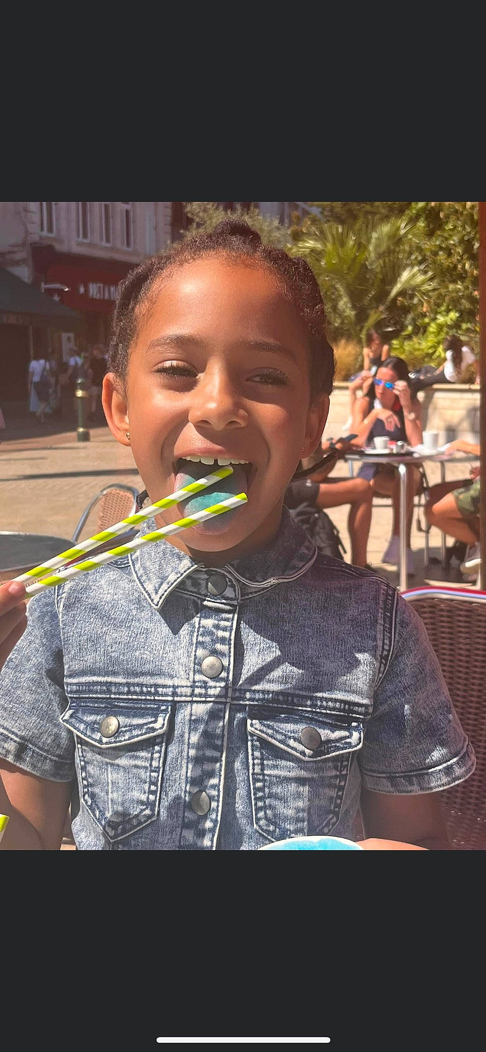 Crystal joined the competition — help win amazing prizes! chair, child, eating, event, finger_food, food, fun, gesture, happy, hawker, joy, junk_food, leisure, person, recreation, road, smile, street, t_shirt, toddler