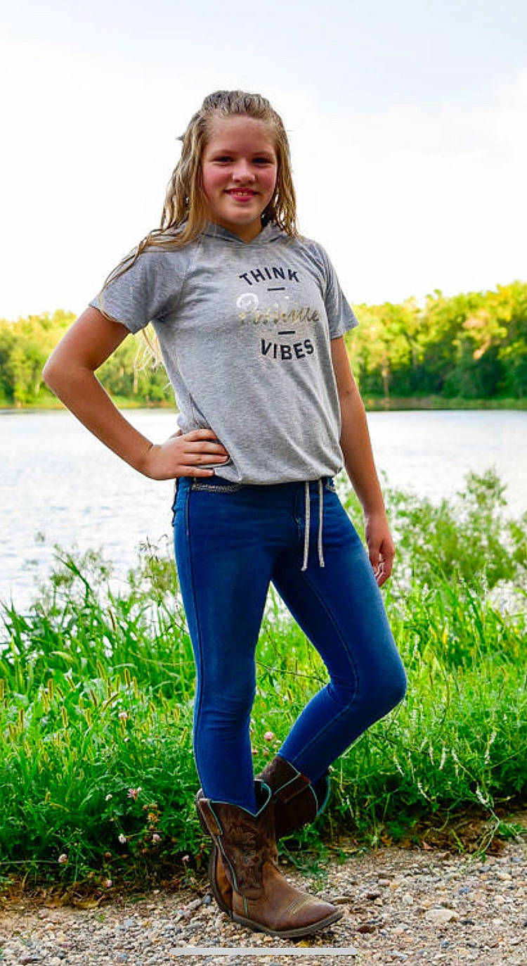 Courtney is registered to the contest to win money with this photo: active_pants, bank, beauty, blond, boot, denim, electric_blue, grass_family, jeans, joy, knee, long_hair, people_in_nature, person, shoulder, sleeve, street_fashion, style, summer, thigh