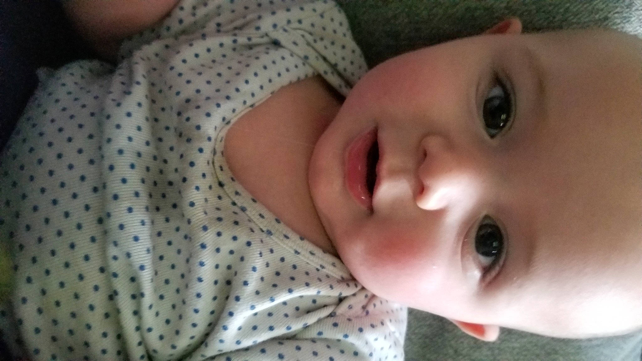 Xavier joined the competition — help win amazing prizes! baby, baby_toddler_clothing, cheek, child, chin, comfort, eye, eyebrow, eyelash, grass, happy, iris, lip, mouth, nose, pattern, person, skin, sleeve, smile