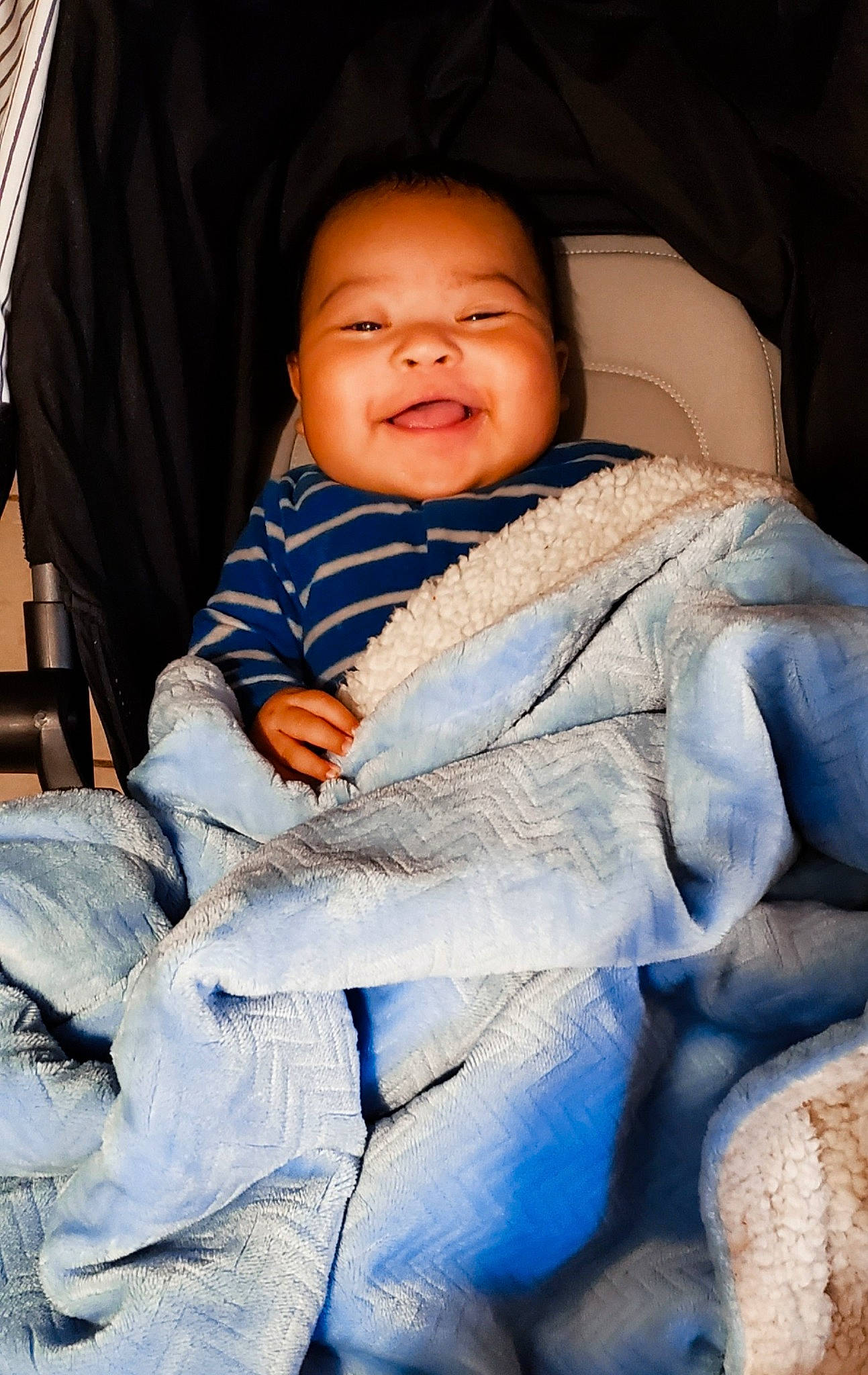 Juan is registered to the contest to win money with this photo: baby, baby_products, baby_toddler_clothing, blanket, cheek, child, comfort, curtain, laugh, person, product, skin, toddler, tooth
