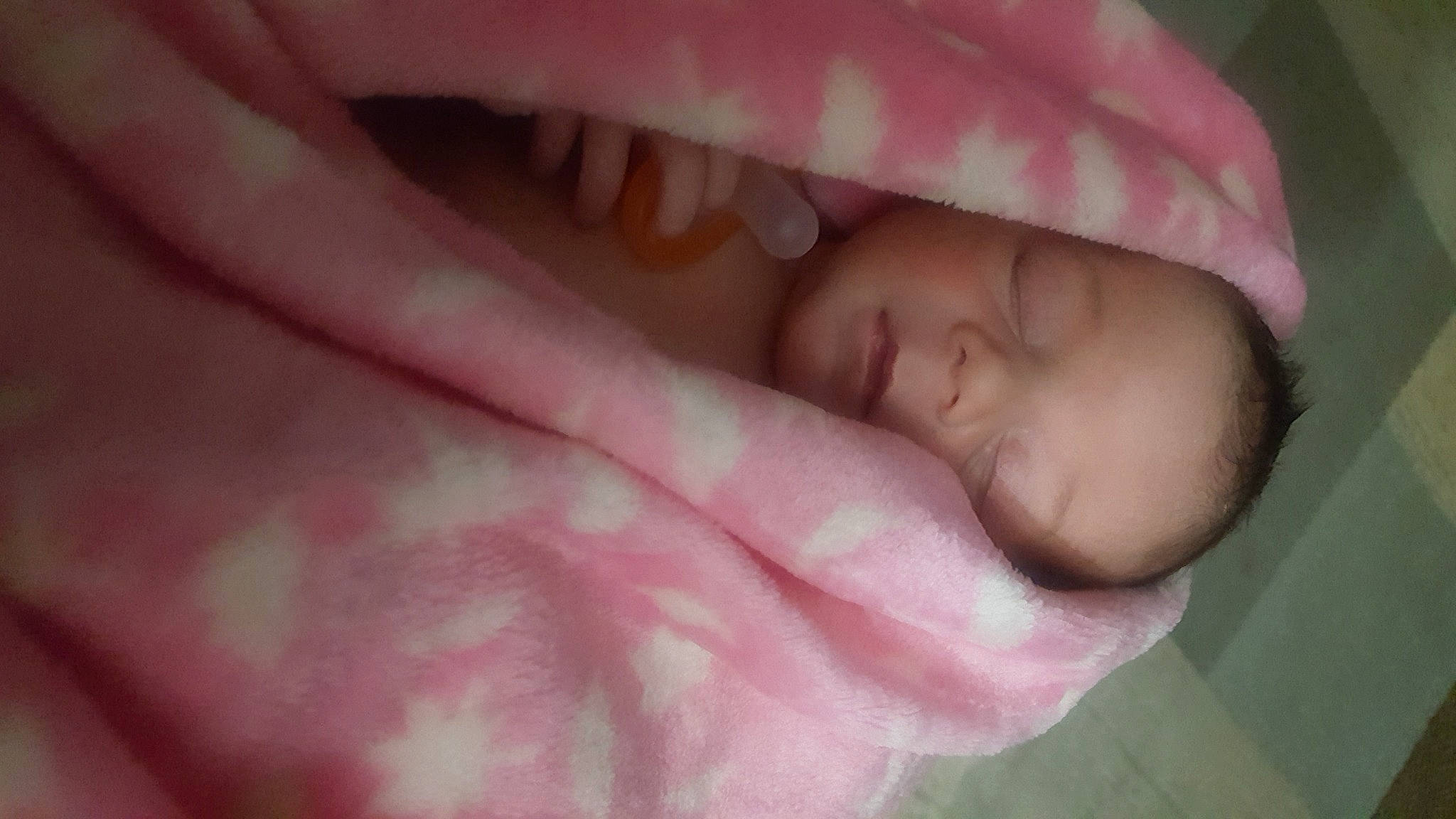 Evelyn is registered to the contest to win money with this photo: baby, bed, bedtime, cheek, child, comfort, eye, finger, flesh, gesture, human_body, linens, magenta, nail, nap, person, pink, sleep, thumb, toddler