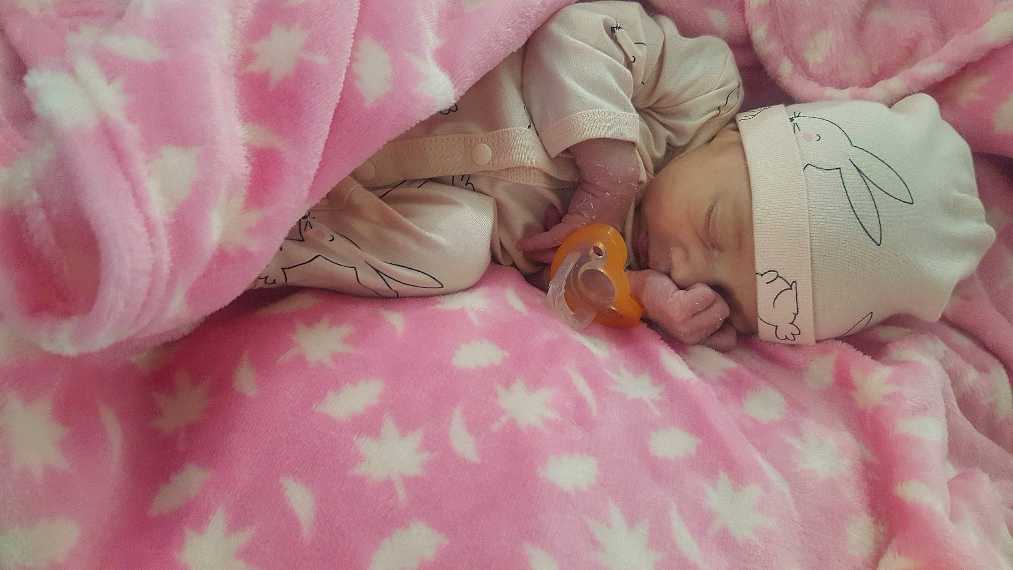 Evelyn joined the competition — help win amazing prizes! art, baby, bed, bedding, child, comfort, eyelash, hand, happy, headwear, linens, magenta, nail, pattern, peach, person, petal, pink, skin, textile