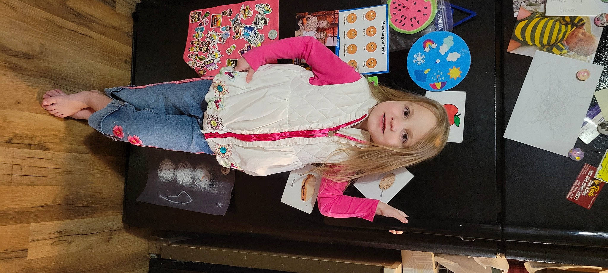 Eve is registered to the contest to win money with this photo: child, comfort, fun, fur, happy, joy, lap, linens, magenta, pattern, person, pink, room, sitting, sleeve, smile, toddler, visual_arts