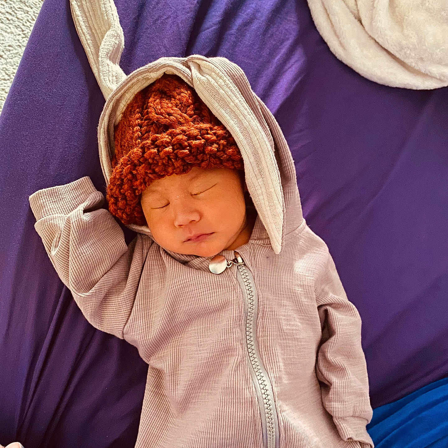 Oliver is registered to the contest to win money with this photo: baby, blanket, bonnet, cap, childbirth, clothing, face, happy, hat, head, hood, newborn, person, photography, portrait, sad, sleeping, smile, yawning