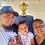Eleonore participe au concours pour gagner de l'argent avec cette photo : family, selfie, man, woman, toddler, child, smile, outdoor, trophy, table, tent, cap, beard, clothing, portrait, happy, gesture, daylight, people, event
