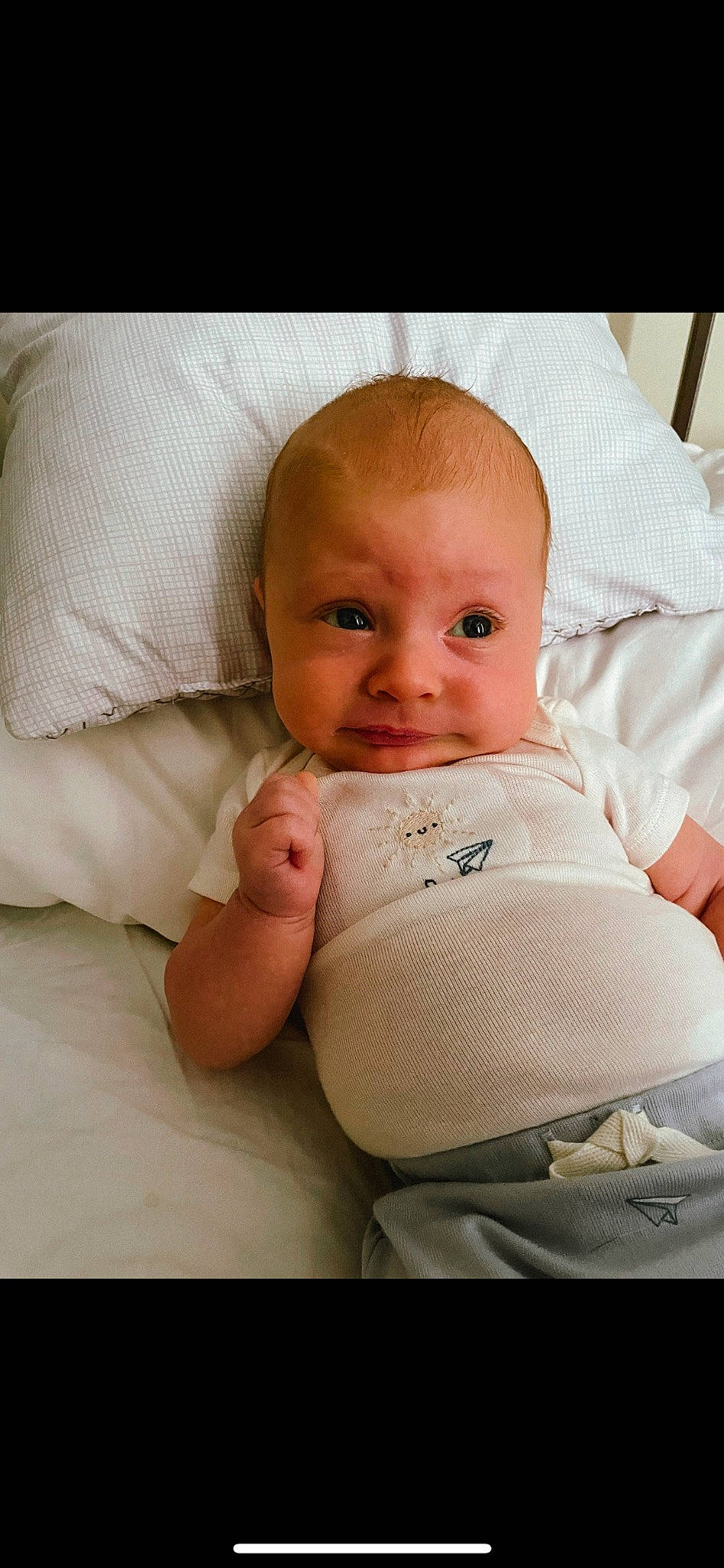 Killian is registered to the contest to win money with this photo: arm, baby, baby_safety, baby_sleeping, baby_toddler_clothing, cheek, chin, comfort, eye, eyebrow, finger, hand, iris, lip, person, product, skin, sleeve, smile, stomach