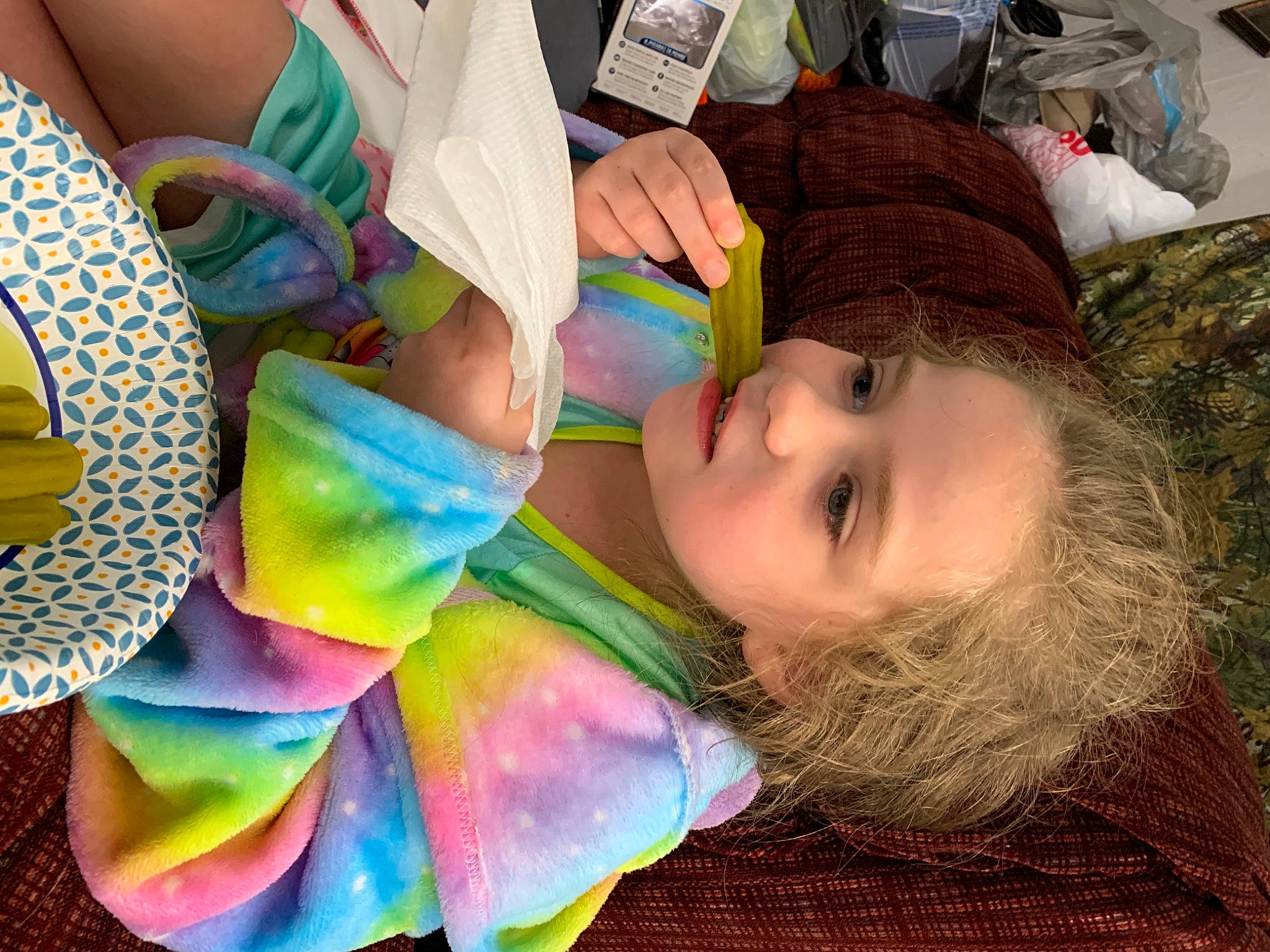 Sally is registered to the contest to win money with this photo: auto_part, automotive_wheel_system, child, eyelash, fashion_accessory, fun, glass, green, paper, party_supply, pattern, person, petal, pinwheel, plastic, play, smile, toddler, tree, visual_arts