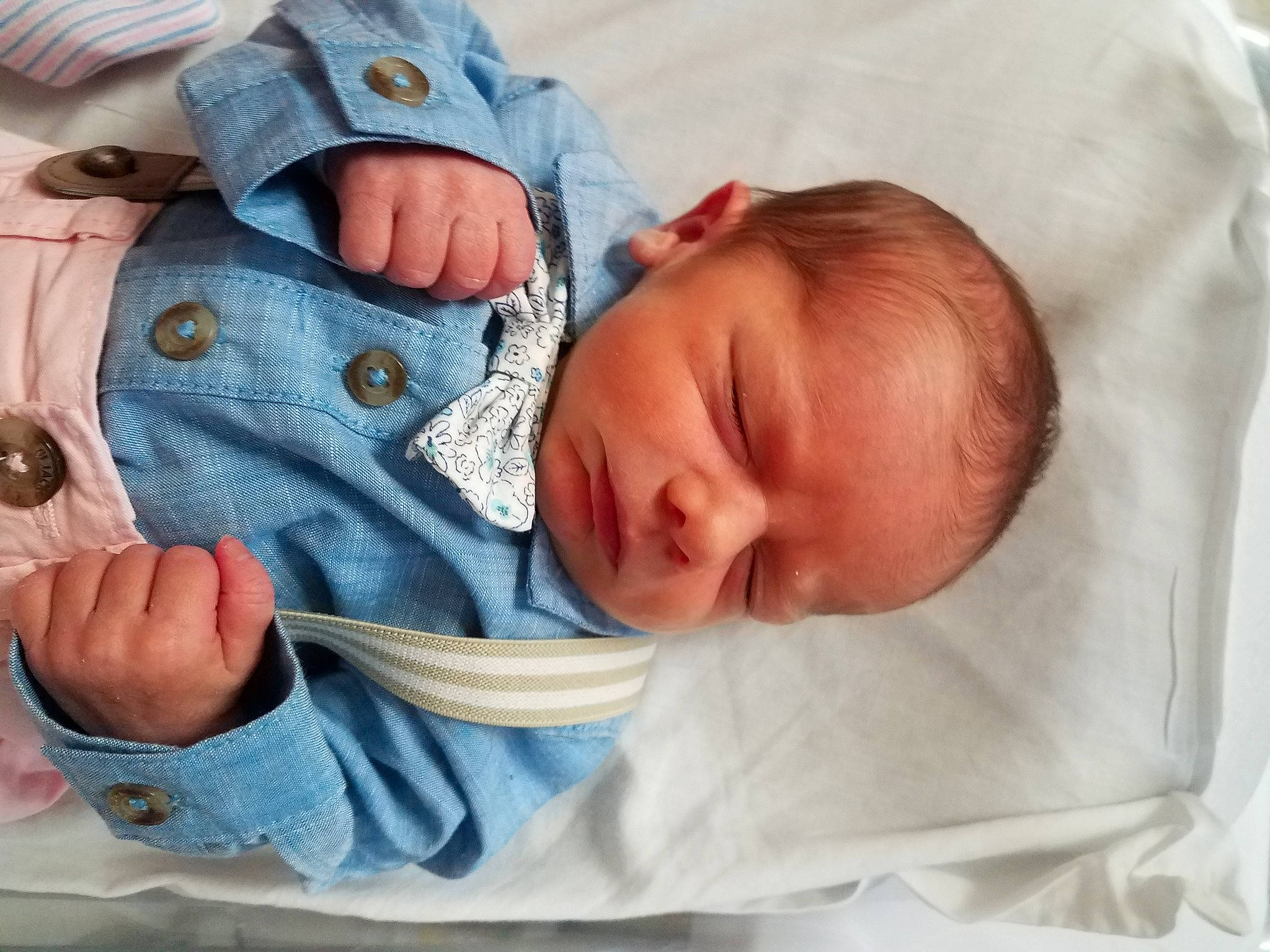 Ashton is registered to the contest to win money with this photo: arm, baby, baby_products, baby_sleeping, baby_toddler_clothing, cheek, child, chin, collar, comfort, eye, finger, gesture, hand, mouth, nose, person, product, skin, sleeve