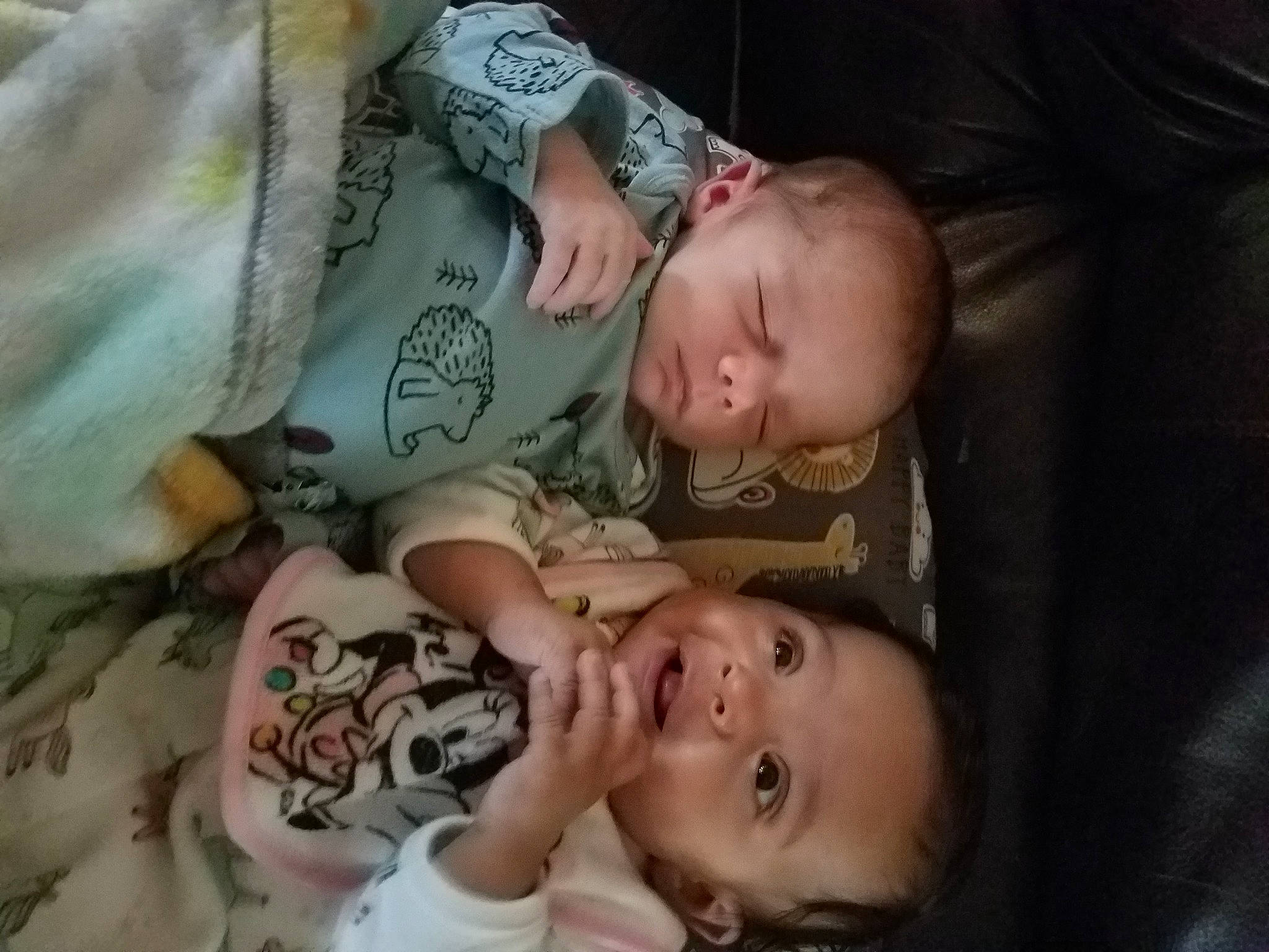 Ashton is registered to the contest to win money with this photo: baby, cheek, chin, comfort, ear, eye, eyebrow, facial_expression, finger, gesture, hairstyle, hand, head, human_body, iris, mouth, nose, person, skin, sleeve