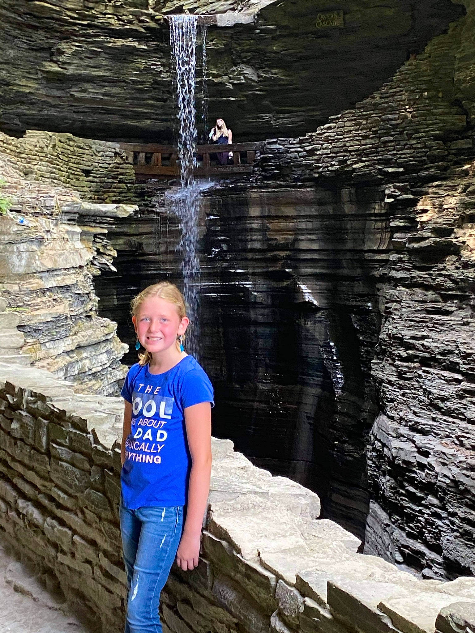 Joanna is registered to the contest to win money with this photo: azure, beauty, bedrock, body_of_water, electric_blue, formation, fun, joy, leisure, people_in_nature, person, recreation, smile, standing, travel, tree, water, water_feature, water_resources, watercourse