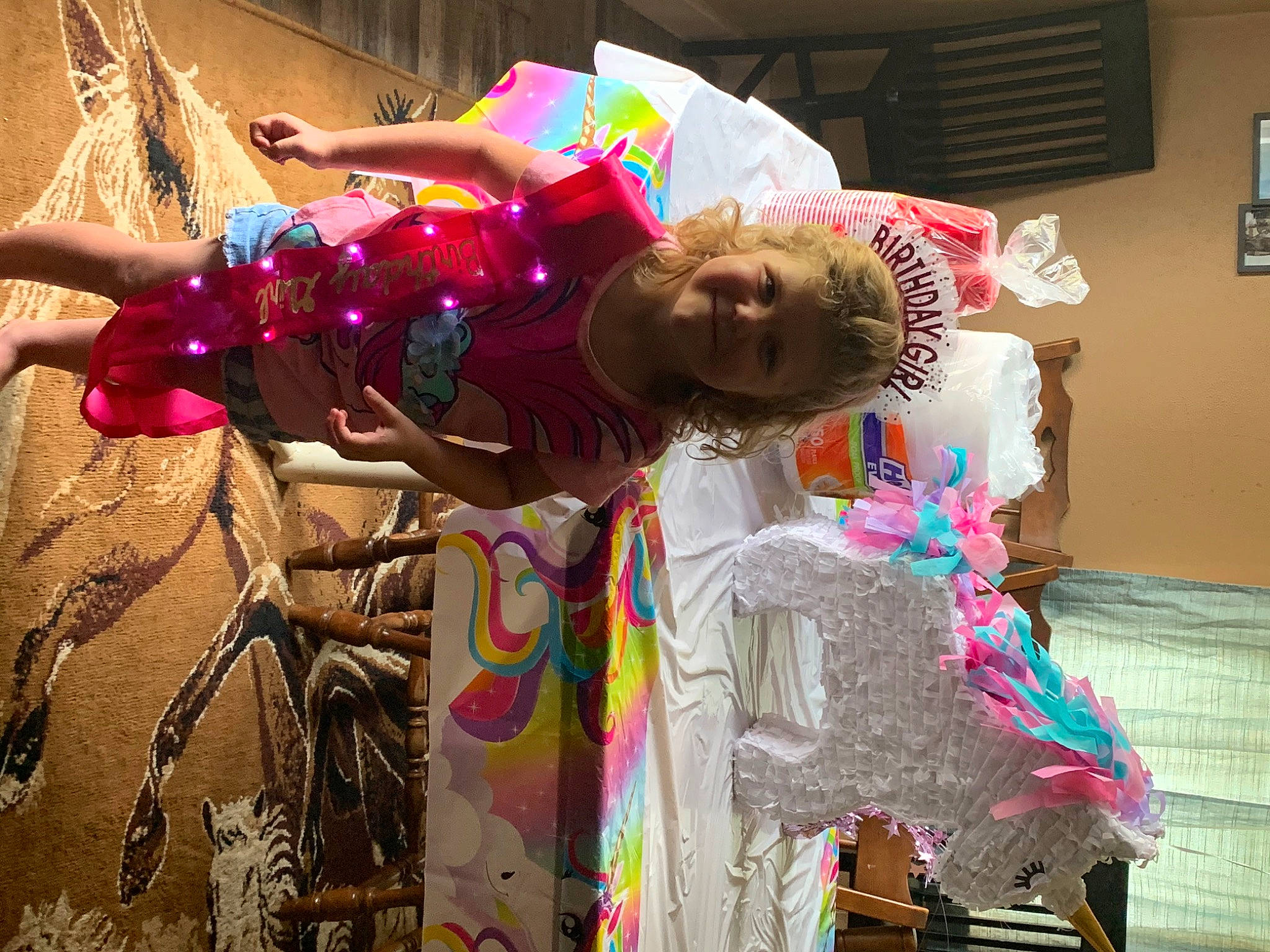 Julie is registered to the contest to win money with this photo: art, costume, event, festival, fun, happy, holiday, joy, magenta, party, party_supply, person, picture_frame, pink, public_event, smile, tradition, visual_arts