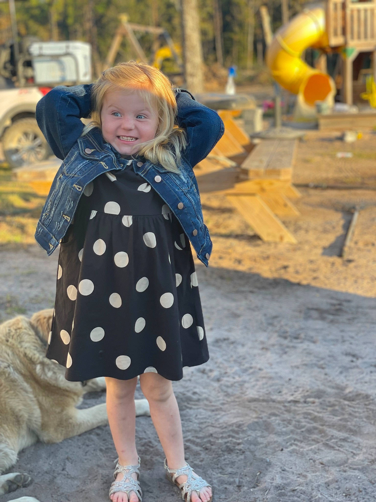 Harper is registered to the contest to win money with this photo: baby_toddler_clothing, child, city, dress, electric_blue, fun, grass, happy, joy, leisure, pattern, people_in_nature, person, public_space, recreation, sleeve, smile, standing, sunglasses, toddler