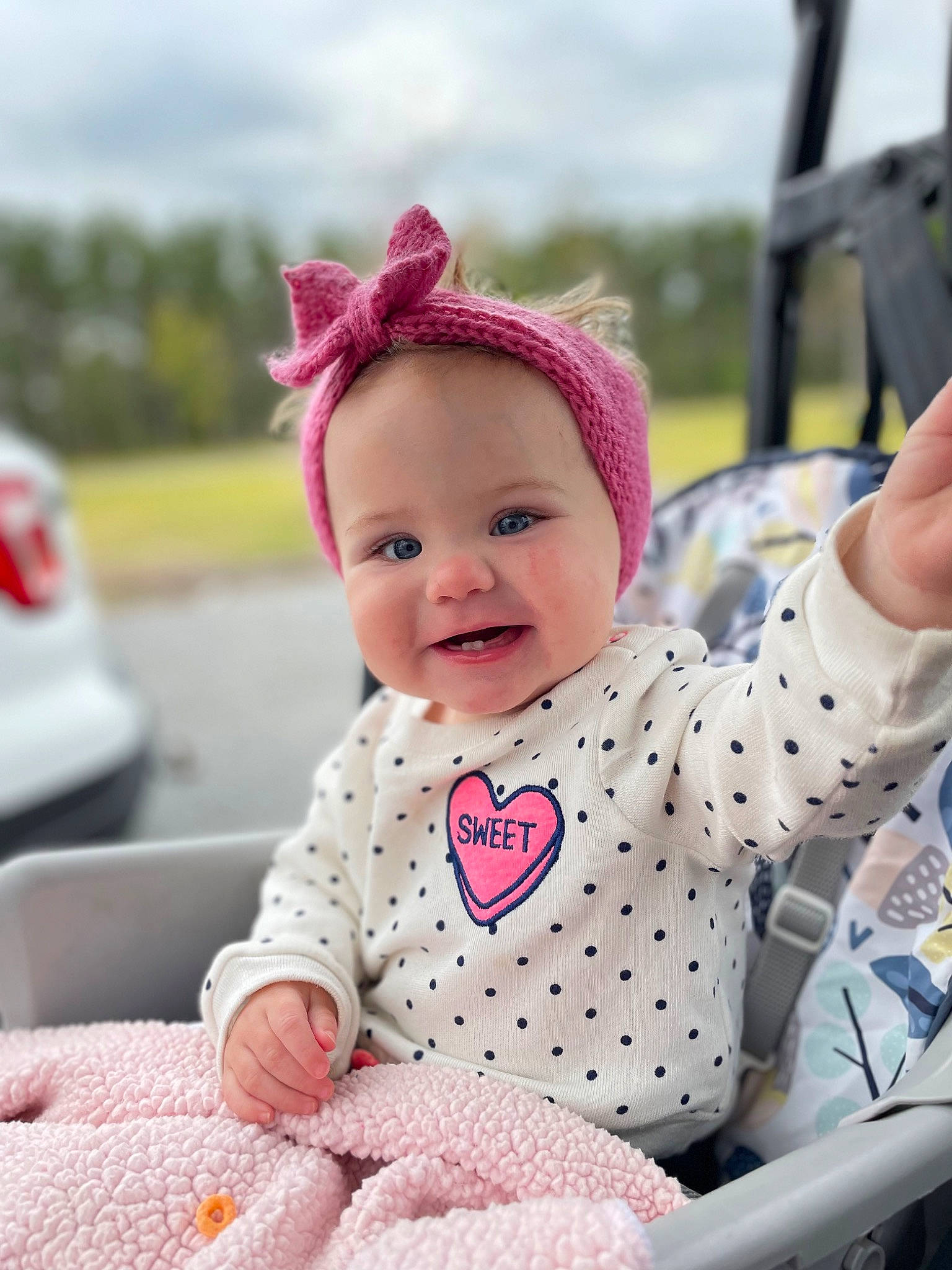 Macie joined the competition — help win amazing prizes! baby, baby_toddler_clothing, beauty, cap, child, event, fun, grass, happy, headgear, joy, leisure, magenta, person, pink, product, recreation, skin, sky, sleeve