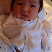 Elaine joined the competition — help win amazing prizes! baby, newborn, infant, white_clothing, diaper, hand, bed, blanket, sleepwear, person, cute, soft_light, indoors, resting, face, skin, hair, expression, comfort, peaceful