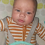 Leemarie joined the competition — help win amazing prizes! baby, infant, child, portrait, face, eyes, wide_eyed, sitting, bouncer, baby_seat, striped_clothing, orange, white, cushion, pillow, indoor, close_up, photography, head, cozy