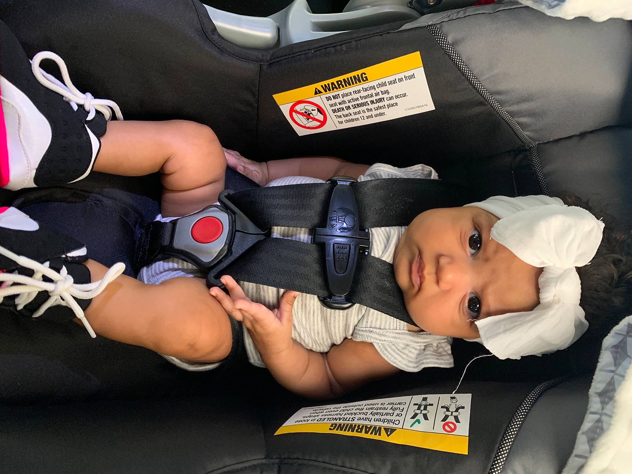 Nova joined the competition — help win amazing prizes! arm, auto_part, car, car_seat, child, headwear, human_body, joint, leg, person, thigh, vehicle