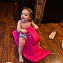 Phenix joined the competition — help win amazing prizes! toddler, child, indoor, toy, rocking_horse, pink, floor, wooden_floor, curly_hair, diaper, barefoot, smiling, happy, play, furniture, household, casual, person, footwear, room