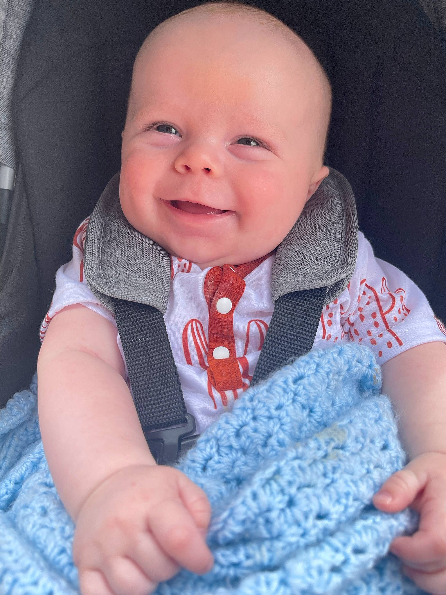 Cade is registered to the contest to win money with this photo: baby, baby_toddler_clothing, cheek, child, collar, comfort, finger, gesture, happy, iris, joy, lip, neck, outerwear, person, pink, skin, sleeve, smile, textile