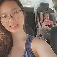 Sasha joined the competition — help win amazing prizes! woman, child, car, car_seat, glasses, piercing, toy, heart_shaped, seat_belt, smile, happy, interior, casual, portrait, family, safety, daylight, vehicle, person, road_trip
