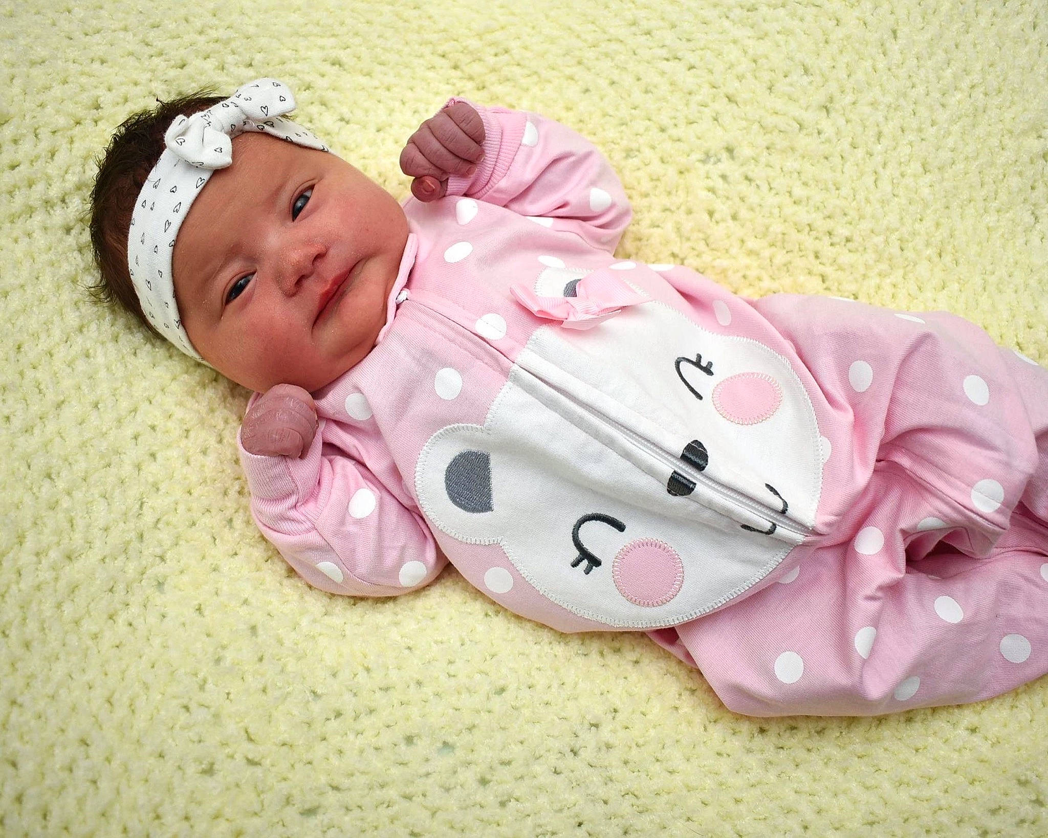 Sylvia is registered to the contest to win money with this photo: baby, baby_products, baby_sleeping, baby_toddler_clothing, child, hair_accessory, head, headgear, headwear, person, pink, product, toddler