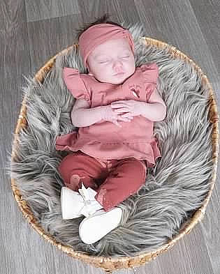 Izabella is registered to the contest to win money with this photo: baby, baby_products, baby_sleeping, baby_toddler_clothing, child, comfort, face, grass, happy, head, human_body, lap, person, pink, product, sitting, sleeve, toddler, tree, wood