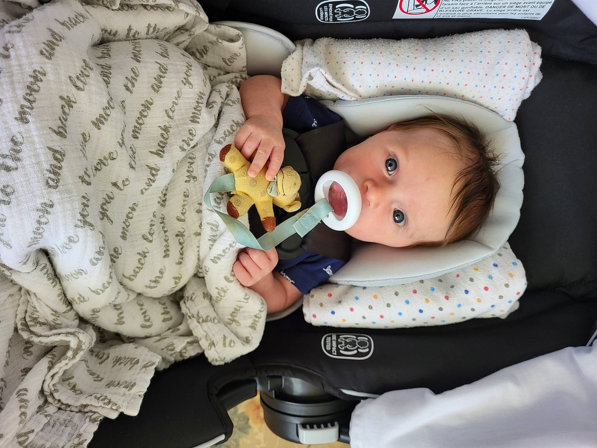 Lilith joined the competition — help win amazing prizes! baby, baby_carriage, baby_products, baby_safety, baby_toddler_clothing, car_seat, cheek, child, comfort, eyelash, finger, hand, handwriting, headgear, nail, pattern, person, product, sitting, textile