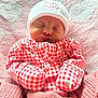baby, newborn, sleeping, blanket, pink, hat, clothing, pattern, strawberry, cozy, cute, infant, portrait, soft, warm, face, headwear, bed, rest, peaceful