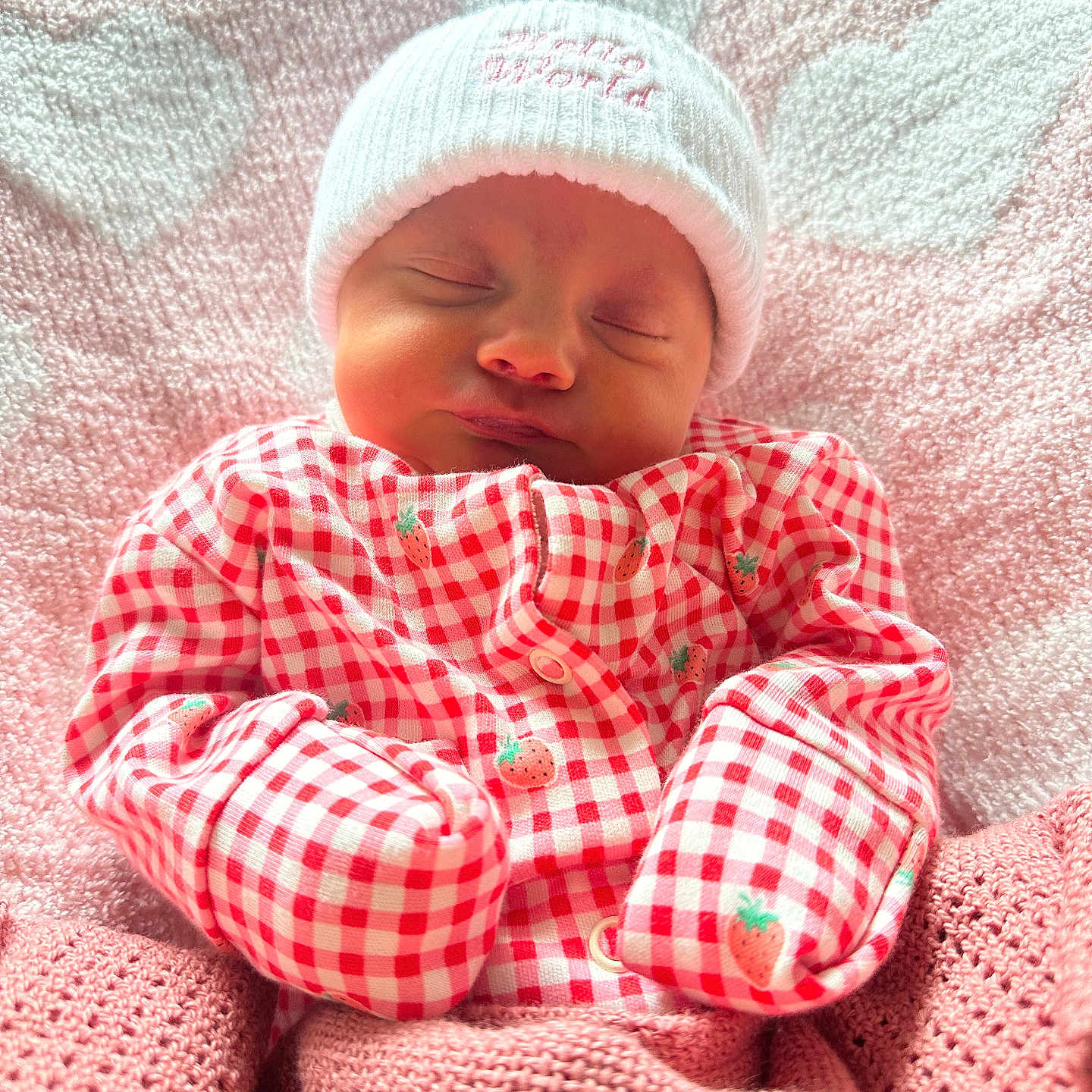 Margot Lynda Stirk joined the competition — help win amazing prizes! baby, bed, blanket, clothing, cozy, cute, face, hat, headwear, infant, newborn, pattern, peaceful, pink, portrait, rest, sleeping, soft, strawberry, warm