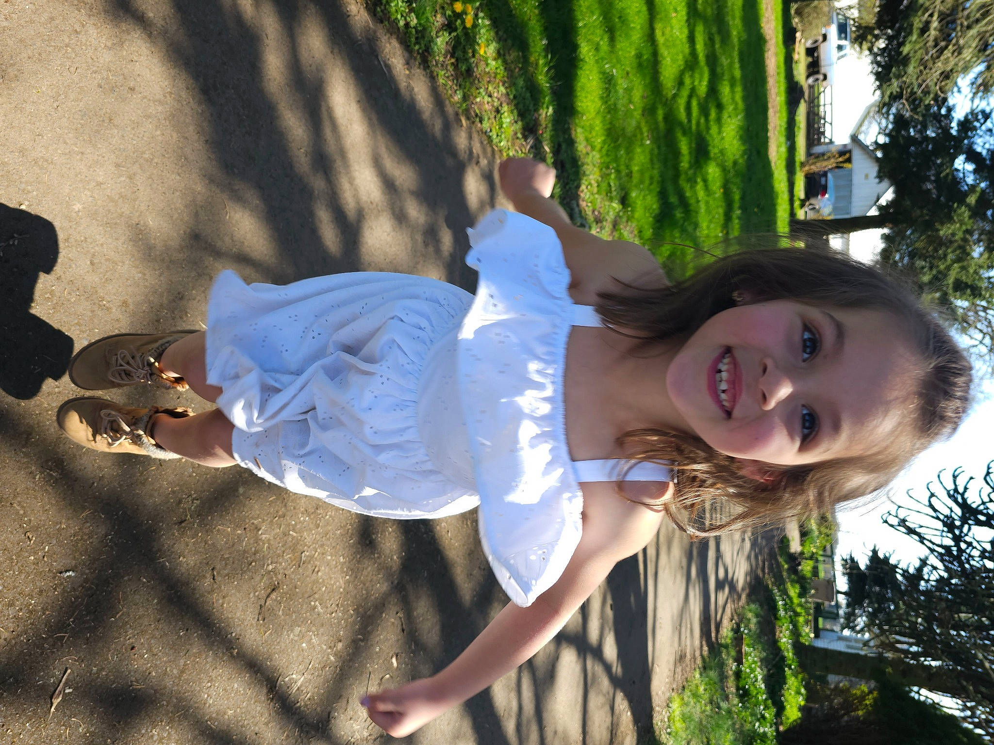 Rosalie is registered to the contest to win money with this photo: beauty, child, electric_blue, eyewear, flash_photography, fun, grass, happy, human_leg, joy, laugh, leisure, natural_environment, people_in_nature, person, plant, recreation, smile, summer, sunlight