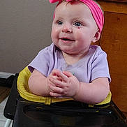 Alice joined the competition — help win amazing prizes! baby, child, infant, headband, pink, purple_shirt, blue_eyes, smile, hands, clapping, high_chair, indoor, wooden_furniture, face, cute, happy, seated, person, young_child, baby_seat