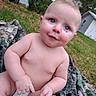 Alice joined the competition — help win amazing prizes! baby, child, blue_eyes, bare_chest, diaper, blanket, outdoor, grass, greenery, shed, smile, curious, infant, nature, camo_pattern, skin, person, young_child, sitting, portrait