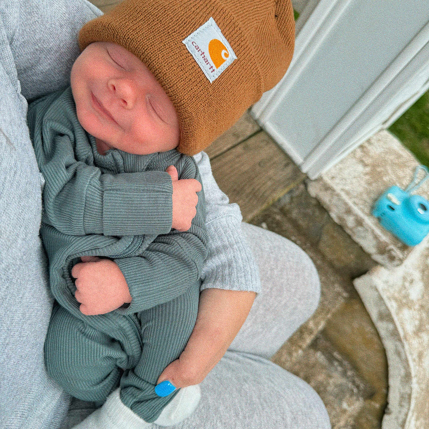 Kayden is registered to the contest to win money with this photo: baby, beanie, blanket, bonnet, cap, clothing, face, furniture, glove, hat, head, jeans, knitwear, newborn, pants, person, photography, portrait, sleeping, sweater