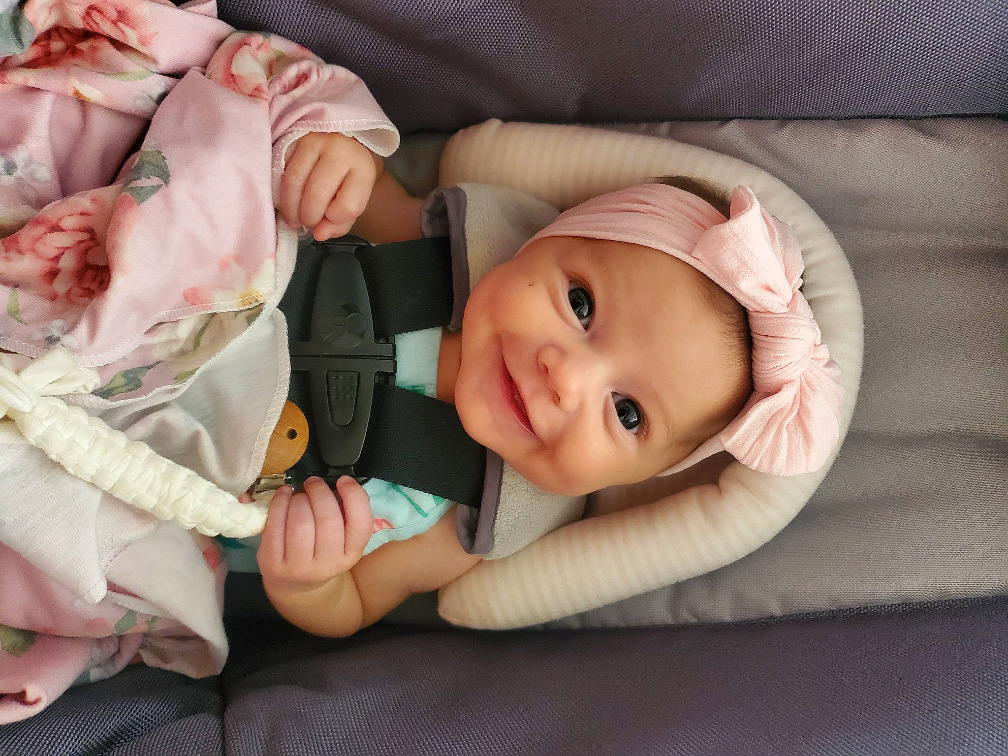 Madelyn is registered to the contest to win money with this photo: baby, baby_toddler_clothing, cheek, comfort, eye, face, facial_expression, finger, gesture, head, headwear, human, joy, lip, mouth, person, product, skin, sleeve, smile