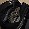 Salem is registered to the contest to win money with this photo: animal, backpack, black, books, carpet, cat, cozy, curious, cute, fur, indoor, kitten, papers, peeking, pet, resting, tabby, whiskers, young, zipper