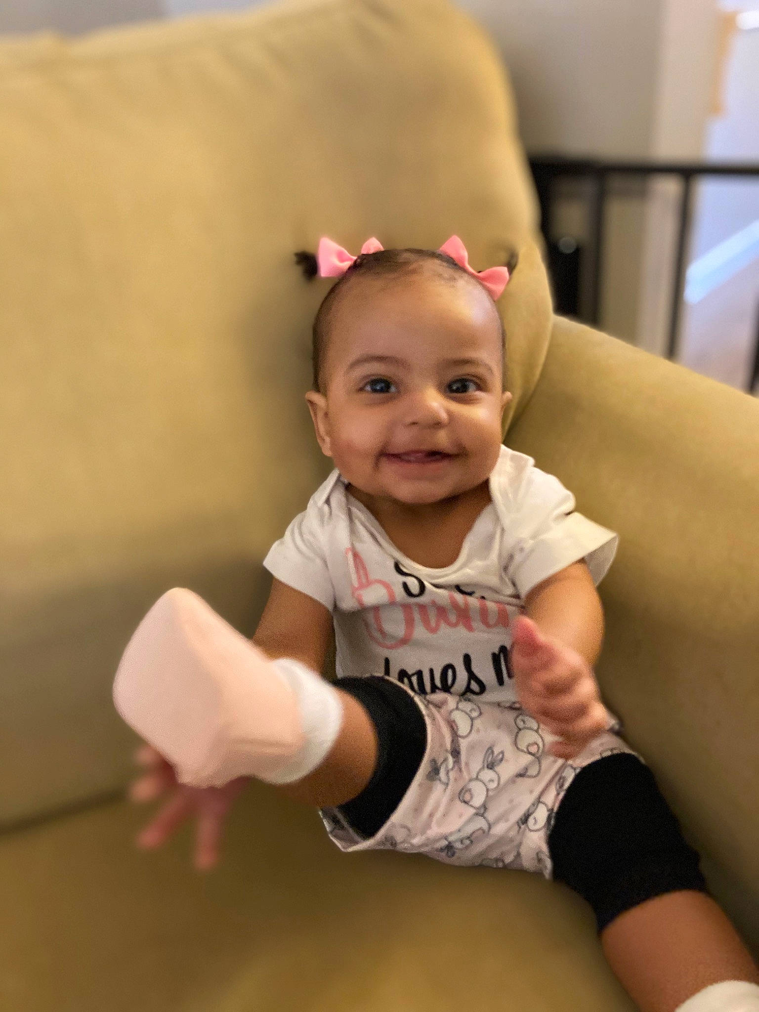 Raelynn joined the competition — help win amazing prizes! arm, baby, baby_toddler_clothing, cheek, comfort, couch, elbow, eye, happy, headband, human_leg, joy, knee, leg, person, skin, sleeve, smile, sock, sportswear