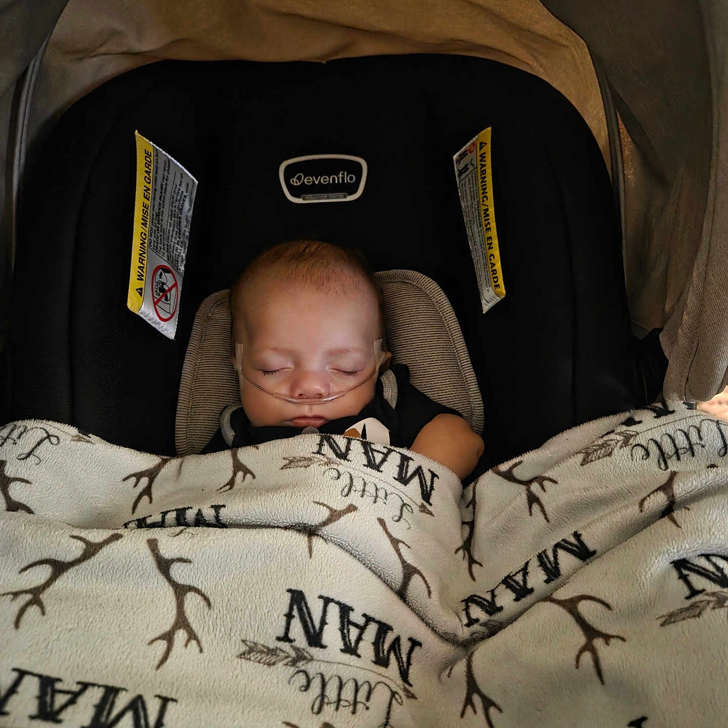 Silver joined the competition — help win amazing prizes! baby, sleeping, blanket, car_seat, oxygen_tube, infant, cozy, rest, child, healthcare, soft_lighting, indoor, closeup, cute, peaceful, wrapped, toddler, newborn, face, comfort