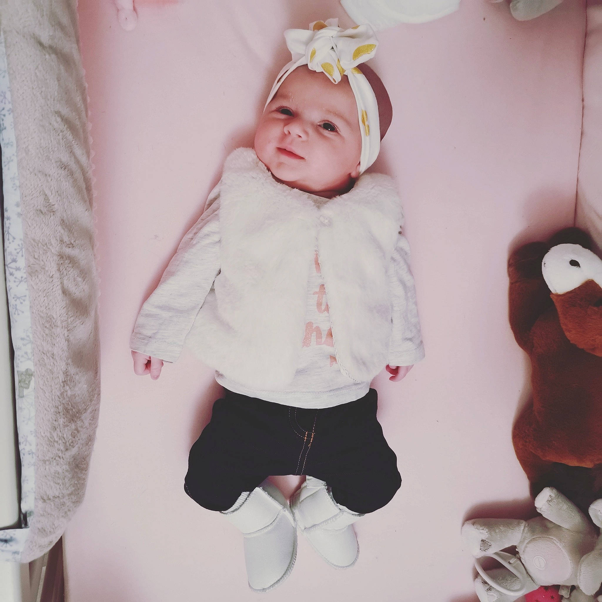 Maëlya a rejoint le concours — aidez-le/la à gagner de superbes lots ! baby, baby_toddler_clothing, child, design, ear, footwear, fur, hood, hoodie, outerwear, pattern, person, pink, product, sleeve, textile, toddler, white