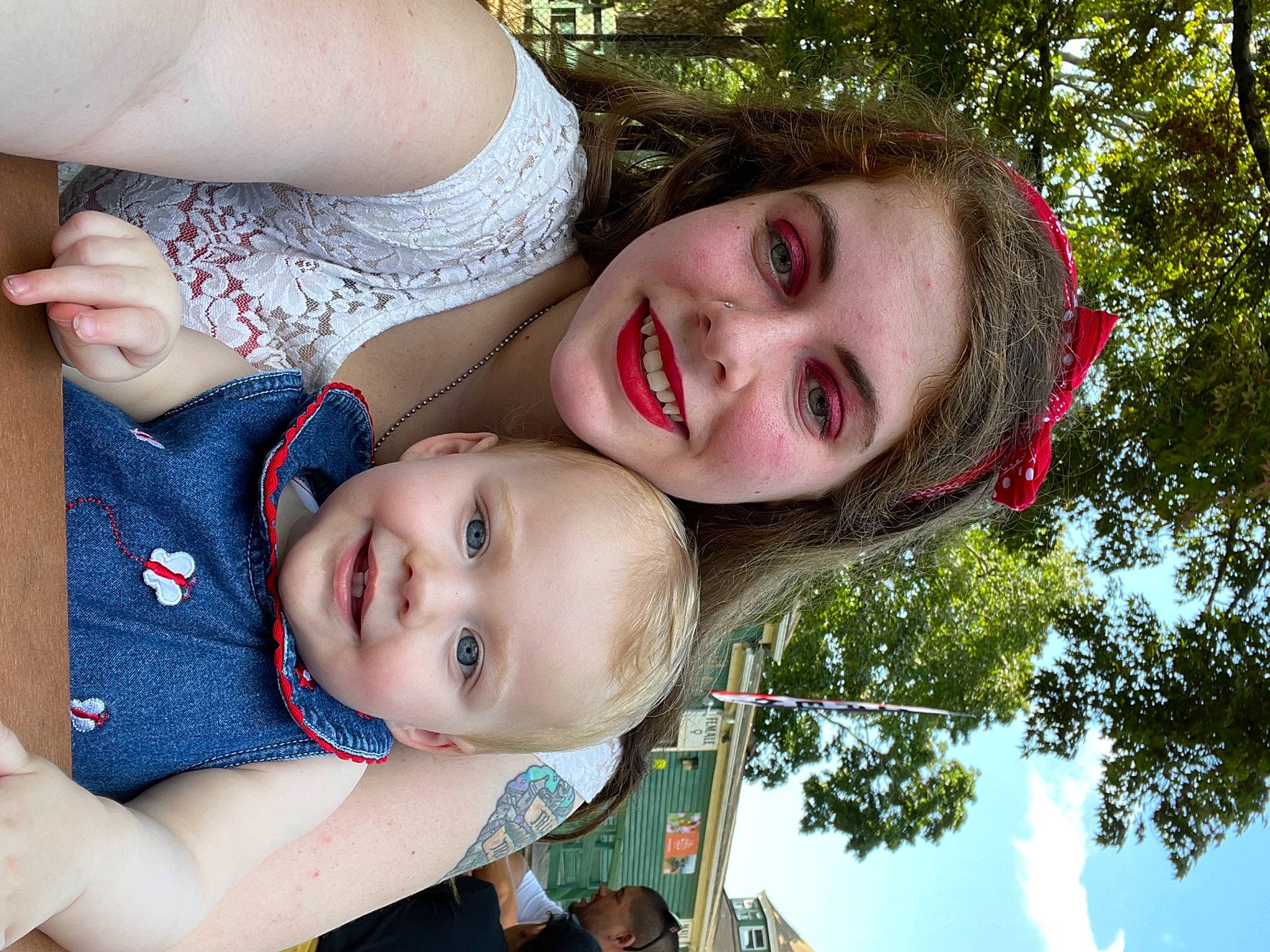 Lily is registered to the contest to win money with this photo: child, eye, fun, gesture, grass, happy, iris, joy, leaf, leisure, lip, mouth, organ, people_in_nature, person, photograph, plant, skin, smile, summer