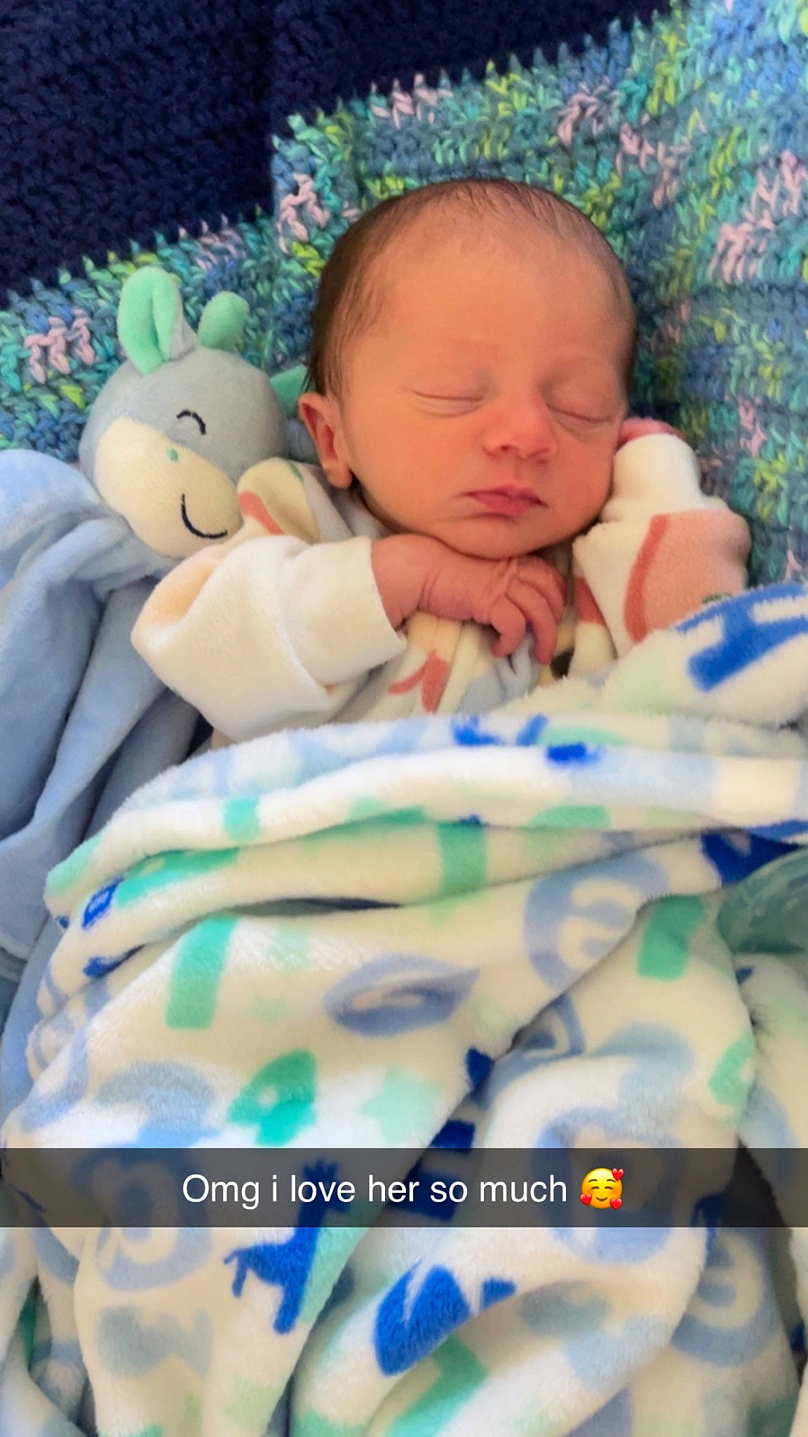 Ember is registered to the contest to win money with this photo: baby, baby_products, baby_safety, baby_sleeping, baby_toddler_clothing, bedding, bedtime, cheek, child, comfort, event, grass, happy, linens, person, product, room, skin, textile, toddler