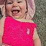 baby, child, infant, smiling, tongue_out, pink_hat, pink_dress, crochet, carpet, cheeks, face, eyes, mouth_open, happy, joyful, portrait, close_up, lying_down, home_interior, clothing