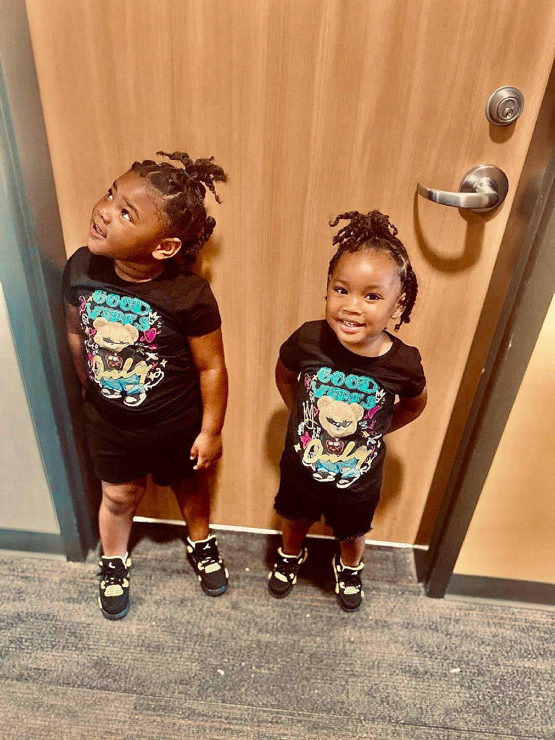 Majesty Carter joined the competition — help win amazing prizes! baby_toddler_clothing, child, door, electric_blue, event, fashion_design, flash_photography, fun, happy, human_leg, joint, joy, magenta, person, product, room, sandal, smile, standing, t_shirt