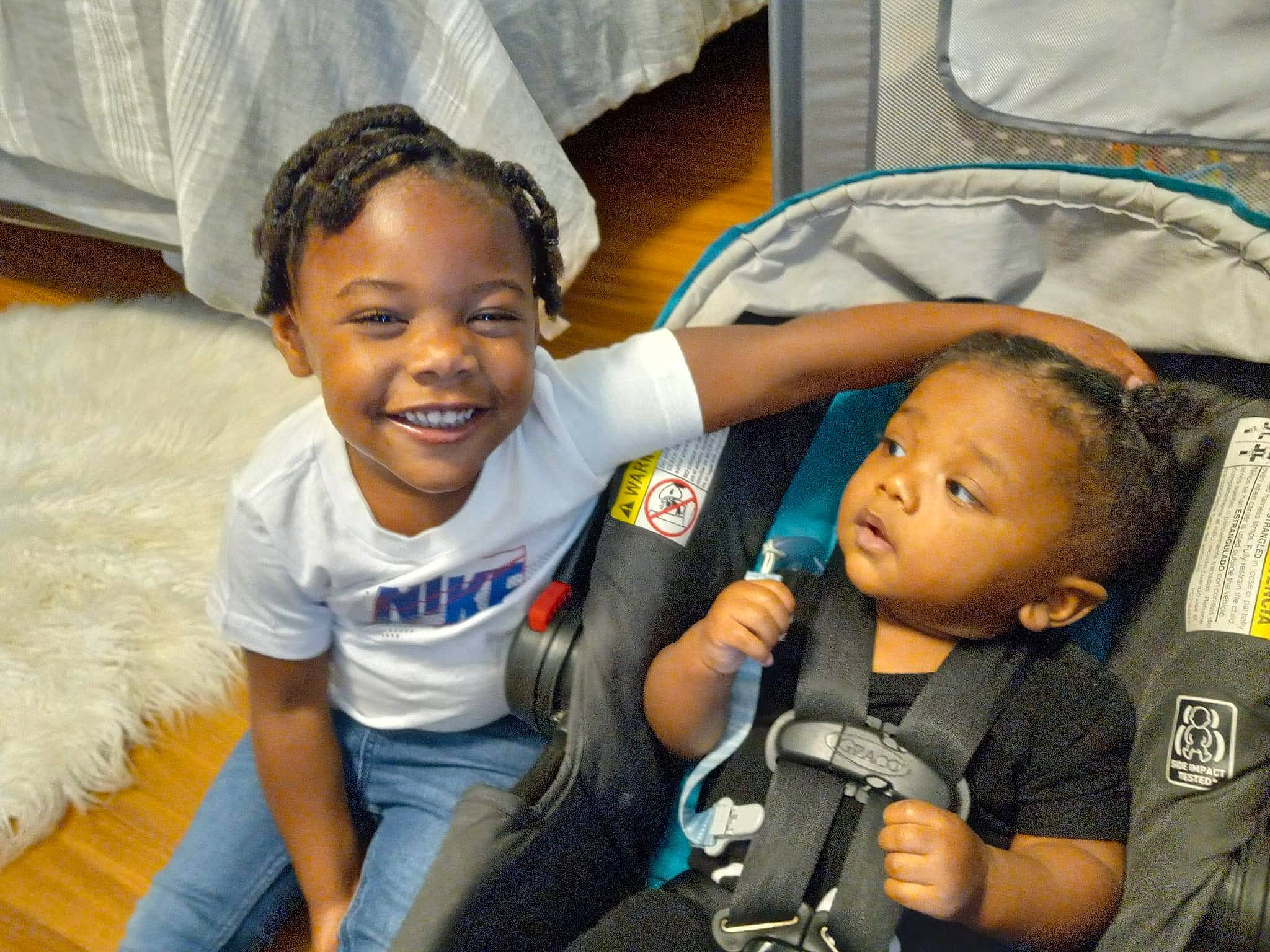 Majesty Carter is registered to the contest to win money with this photo: baby, baby_toddler_clothing, child, event, eye, facial_expression, fun, gesture, hairstyle, happy, head, human, joy, leisure, person, product, skin, smile, t_shirt, toddler