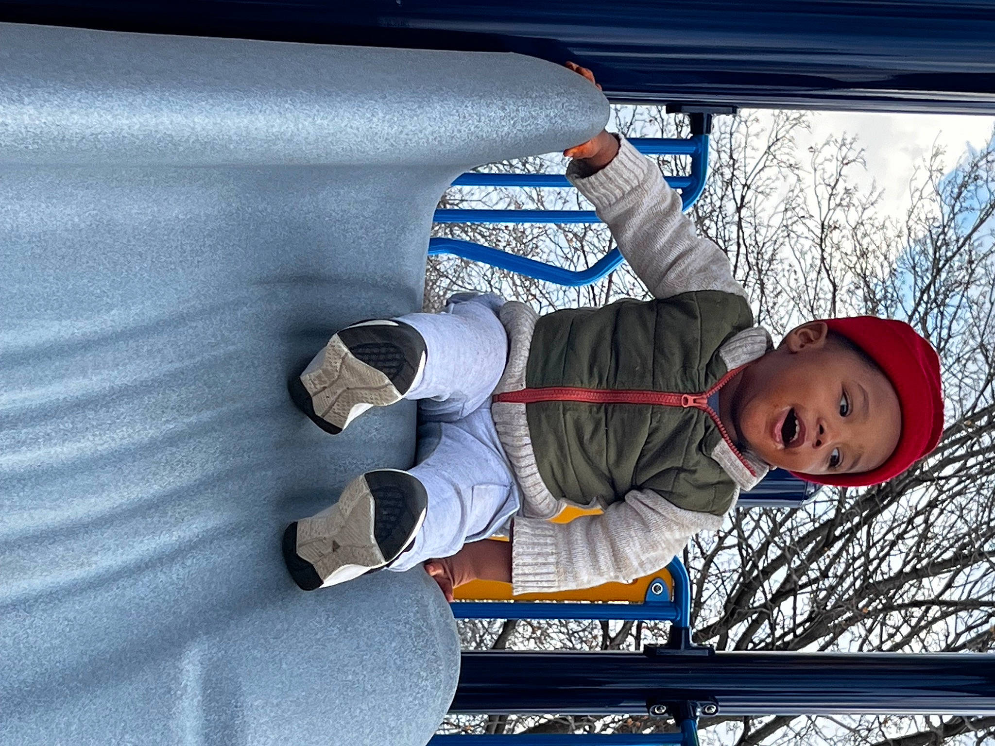 King is registered to the contest to win money with this photo: carmine, child, cloud, elbow, electric_blue, freezing, fun, gesture, happy, hat, headwear, leisure, person, recreation, sky, smile, snow, toddler, tree, walking_shoe